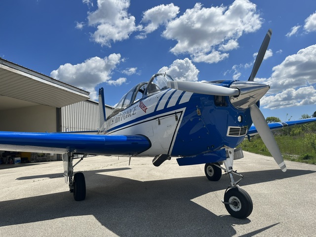 Restored vintage U.S. Air Force training aircraft, nose-on view